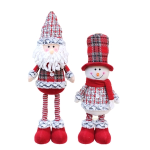 Standing Santa Claus and snowman plush dolls with red and grey plaid holiday outfits