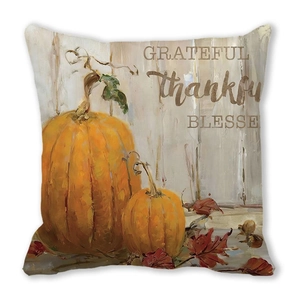 Détail de la housse de coussin de Thanksgiving avec citrouilles et texte Grateful