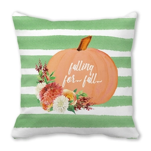 Detail of pumpkin and falling for fall text on striped Thanksgiving pillowcase
