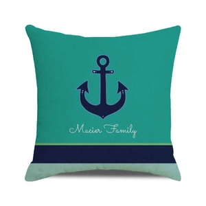 Vue détaillée du motif ancre marine sur housse de coussin vert sarcelle en lin Macier Family