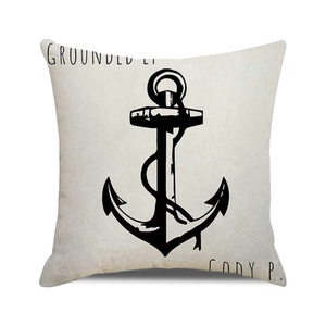 Détail de l'imprimé ancre nautique et texte Grounded Life sur housse de coussin