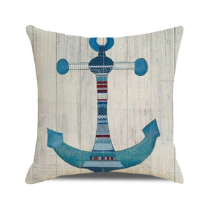 Détail d'une housse de coussin à motif ancre nautique avec textures rétro journal