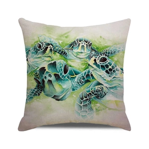 Detailed close-up of watercolor sea turtle printed on square linen cushion cover fabric