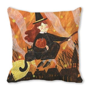 Detail of square Halloween cushion cover featuring a hand-drawn witch on a broomstick