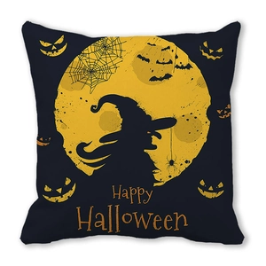 Detail of Happy Halloween cushion cover featuring witch silhouette and jack-o'-lantern