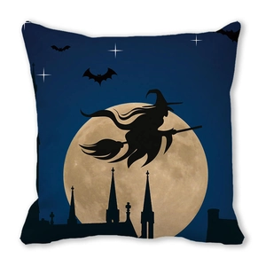 Detail of Halloween pillowcase with witch on broom, moon, bats and castle silhouette