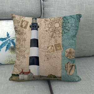 Close-up of vintage nautical lighthouse and seashell patterns on linen pillow cover