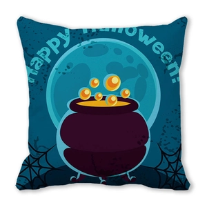 Close-up of Halloween cushion cover showing purple cauldron and full moon illustration