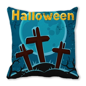 Detail of Halloween pillow case with blue moon, crosses, and spooky woods silhouette