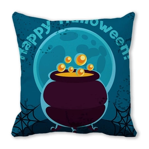 Macro detail of Halloween pillow cover featuring a purple cauldron and orange bubbles