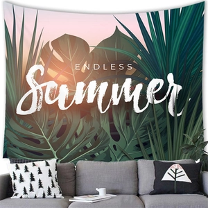 Tropical monstera leaf wall tapestry with Endless Summer text above a sofa