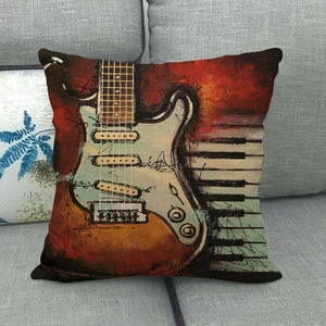 Artistic oil painting cushion cover with electric guitar and piano keys on grey sofa
