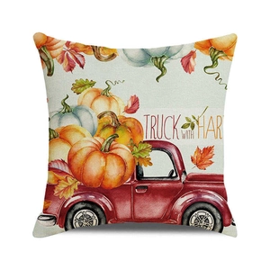 Detailed texture of linen cushion cover featuring watercolor harvest pumpkin truck print