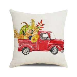 Detail of linen texture on square cushion cover with watercolor pumpkin truck print