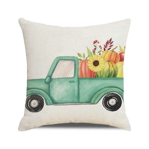 Detail of linen texture on harvest festive pillow cover with watercolor pumpkin truck