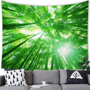 Bamboo forest scenery wall tapestry hanging above a grey sofa for home decor
