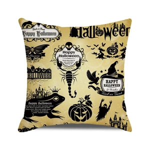 Detail of Halloween throw pillow cover featuring vintage skull and pumpkin motifs on beige fabric