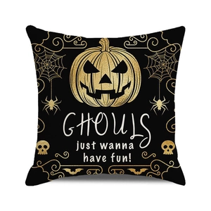 Detail of Halloween pillow case with golden pumpkin and spooky spider web patterns