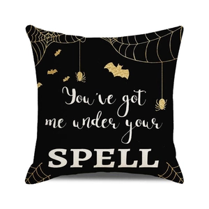 Detail of Halloween pillowcase with gold spider web and You've got me under your spell print