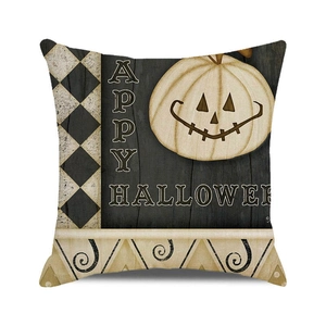Macro view of Happy Halloween cushion cover with white pumpkin and checkered patterns