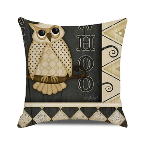 Macro shot of rustic cotton linen cushion cover featuring owl print and HOO lettering