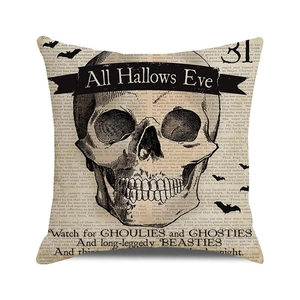 Detail of Halloween cushion cover with vintage newspaper skull and All Hallows Eve text