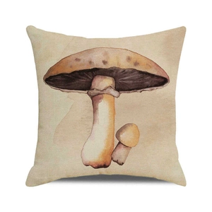 Detailopname van vierkante kussenhoes met aquarel paddenstoelen en linnen textuur
