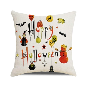 Macro shot of Halloween cushion cover fabric with ghosts and pumpkin illustrations