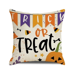 Detailed view of Trick or Treat Halloween pillow cover with festive pumpkin and candy prints