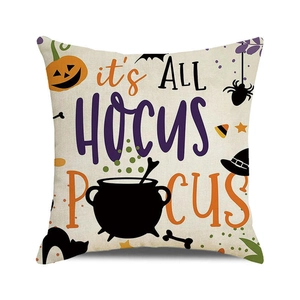 Detail of Halloween pillow case with hocus pocus text and vibrant pumpkin print