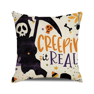 Detail of linen Halloween pillowcase with reaper and Creepin' it Real text