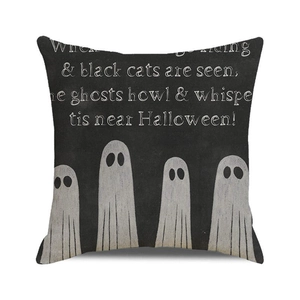 Detail view of Halloween pillow cover featuring ghosts and spooky poem on black canvas