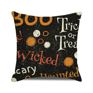 Detailed texture of Halloween throw pillow cover featuring Boo and Trick or Treat prints