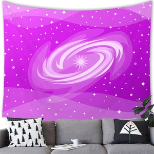 Hanging purple galaxy nebula tapestry displayed on a wall above a cozy grey sofa