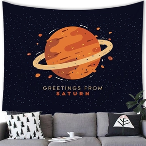 Detail of Saturn wall tapestry showing Greetings From Saturn print over a grey sofa