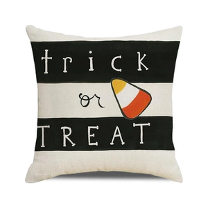 Halloween Trick or Treat throw pillow cover with black and white stripes and candy motif