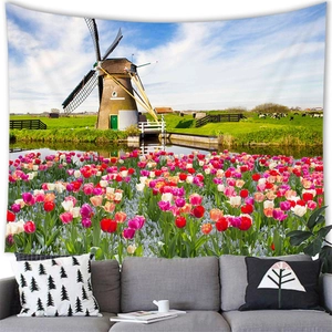Detail of wall tapestry featuring Dutch windmills and colorful tulip field scenery