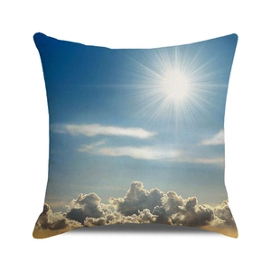 Detailed digital printing of blue sky and sun landscape on a square linen cushion cover