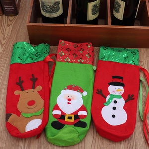 Three-piece set of Christmas sequined wine bottle bags with Santa, reindeer, and snowman