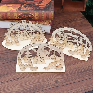 Detailed laser-cut wooden Christmas decorations with nativity, snowman and Santa motifs