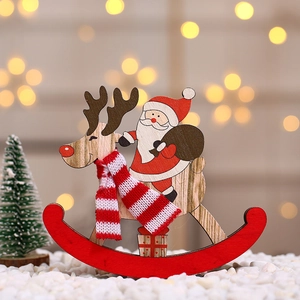Detail of wooden Christmas rocking horse ornament with Santa riding a reindeer