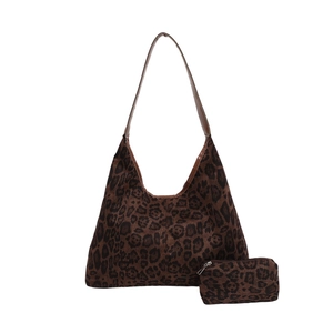 Minimalist leopard print tote bag with matching zipper pouch and brown shoulder straps