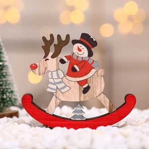 Detail of wooden rocking Christmas reindeer and snowman ornament with laser-cut textures