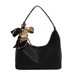 Classic black pebble leather hobo shoulder bag featuring a stylish printed silk scarf