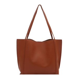 Brown leather tote bag for women with minimalist retro design and spacious interior