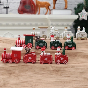 Detailed close-up of decorative wooden Christmas trains with festive bears and snowmen figures