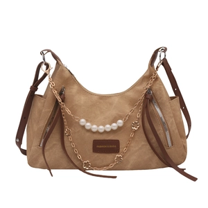 Bohemian canvas shoulder bag with pearl charms and metal chain in earth tone