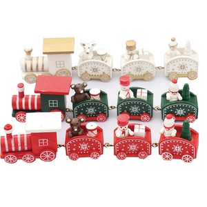 Three colorful Christmas wooden trains with snowman and bear figurines on white background