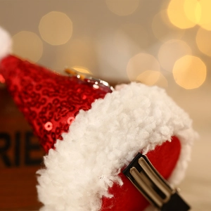 Barrette mini bonnet de Noël à paillettes rouges avec bordure en peluche blanche pour fêtes