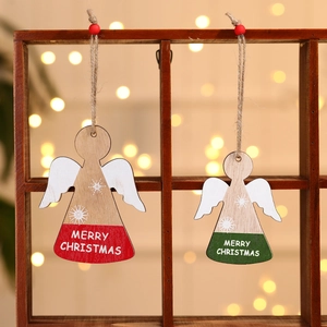 Detail of wooden angel ornaments with Merry Christmas text and festive snowflake patterns